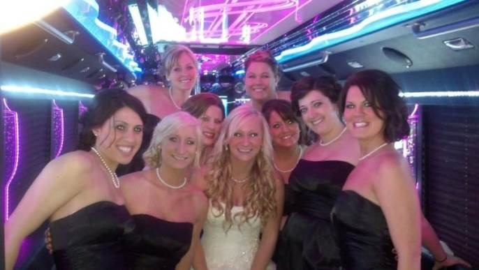 Happy customers enjoying luxury limousine service from www.transportpathhub.pro in a memorable experience.